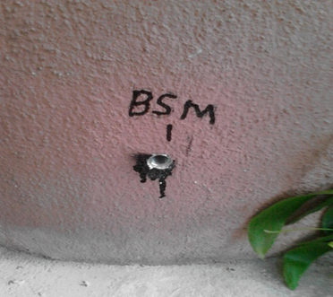Settlement & ground monitoring — Building settlement marker installation.